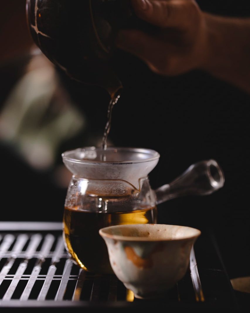 Herbal tea poured by hand